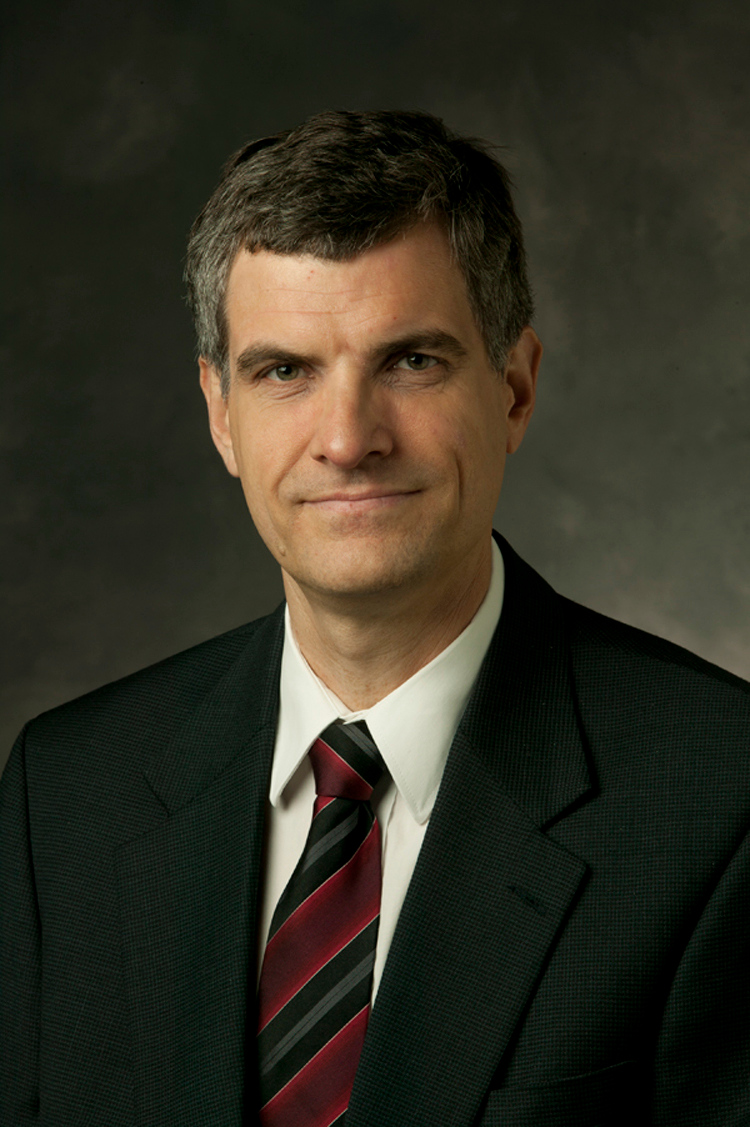Color photograph of Curator Anatol Shmelev