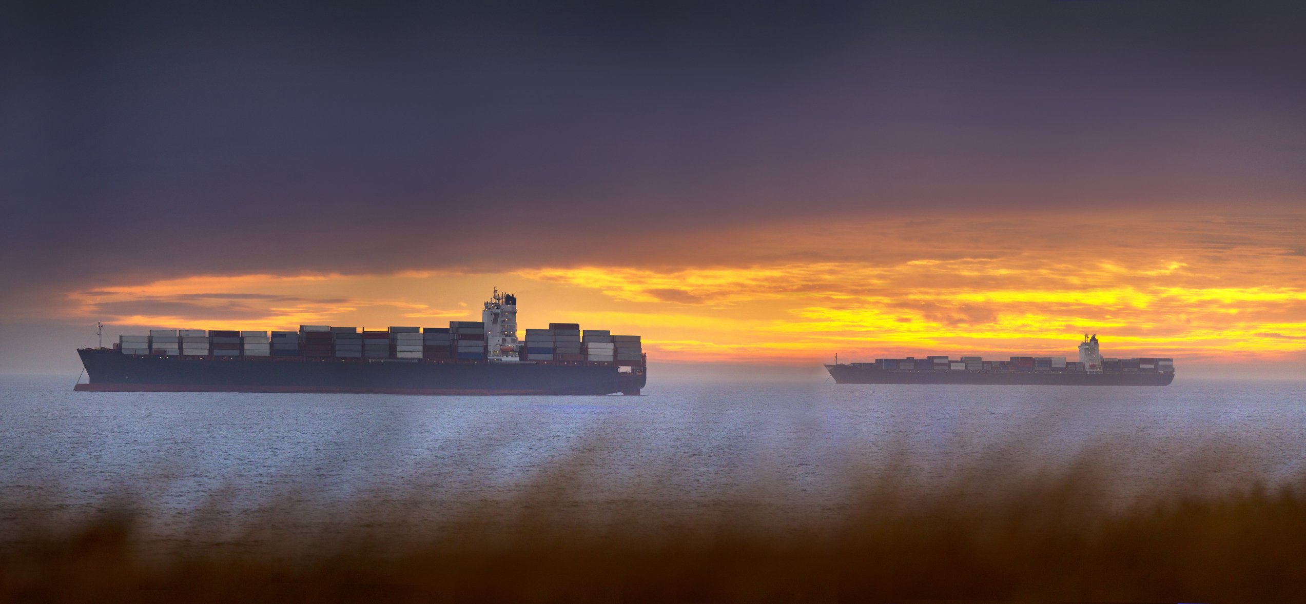 High resolution image of Container ships waiting to enter Cape Town harbour. - stock photo
