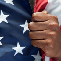 iStock of a Black American holding the American flag