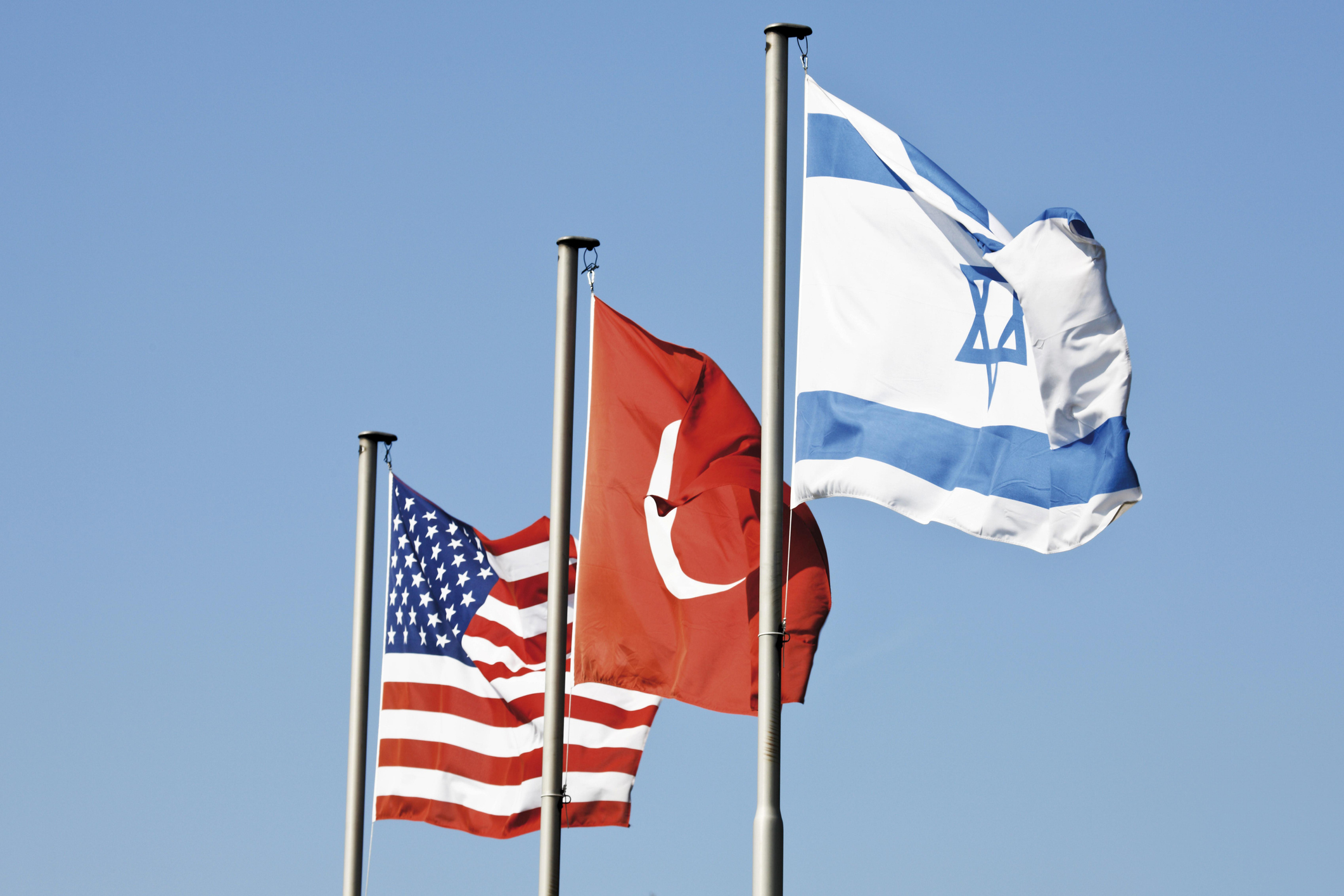 Flags on the mast, USA, Turkey, Israel - stock photo
