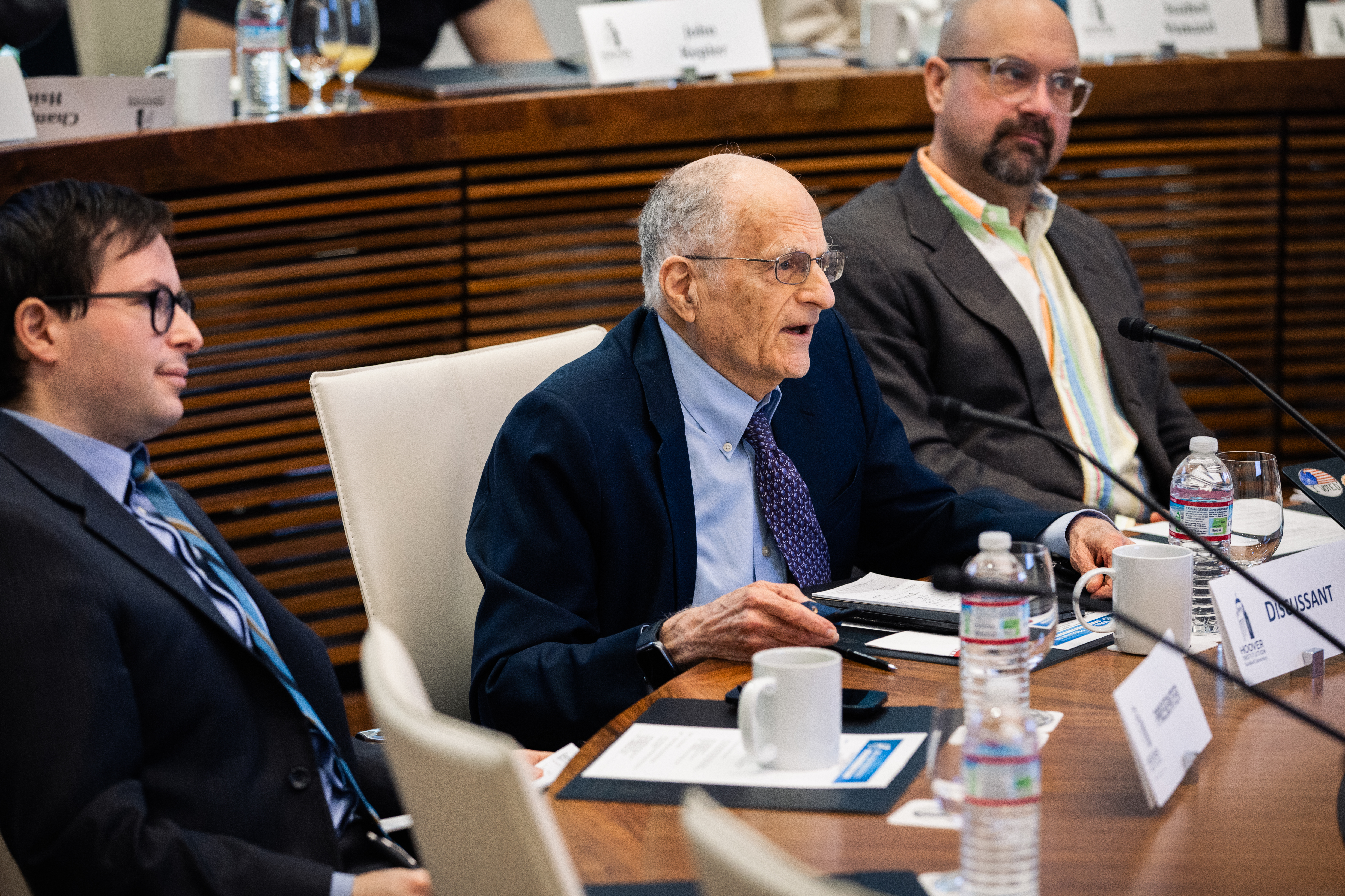 Renowned Nobel laureate in economic sciences and adjunct Hoover Senior Fellow Thomas Sargent delivers comments on one of the papers presented at the conference.