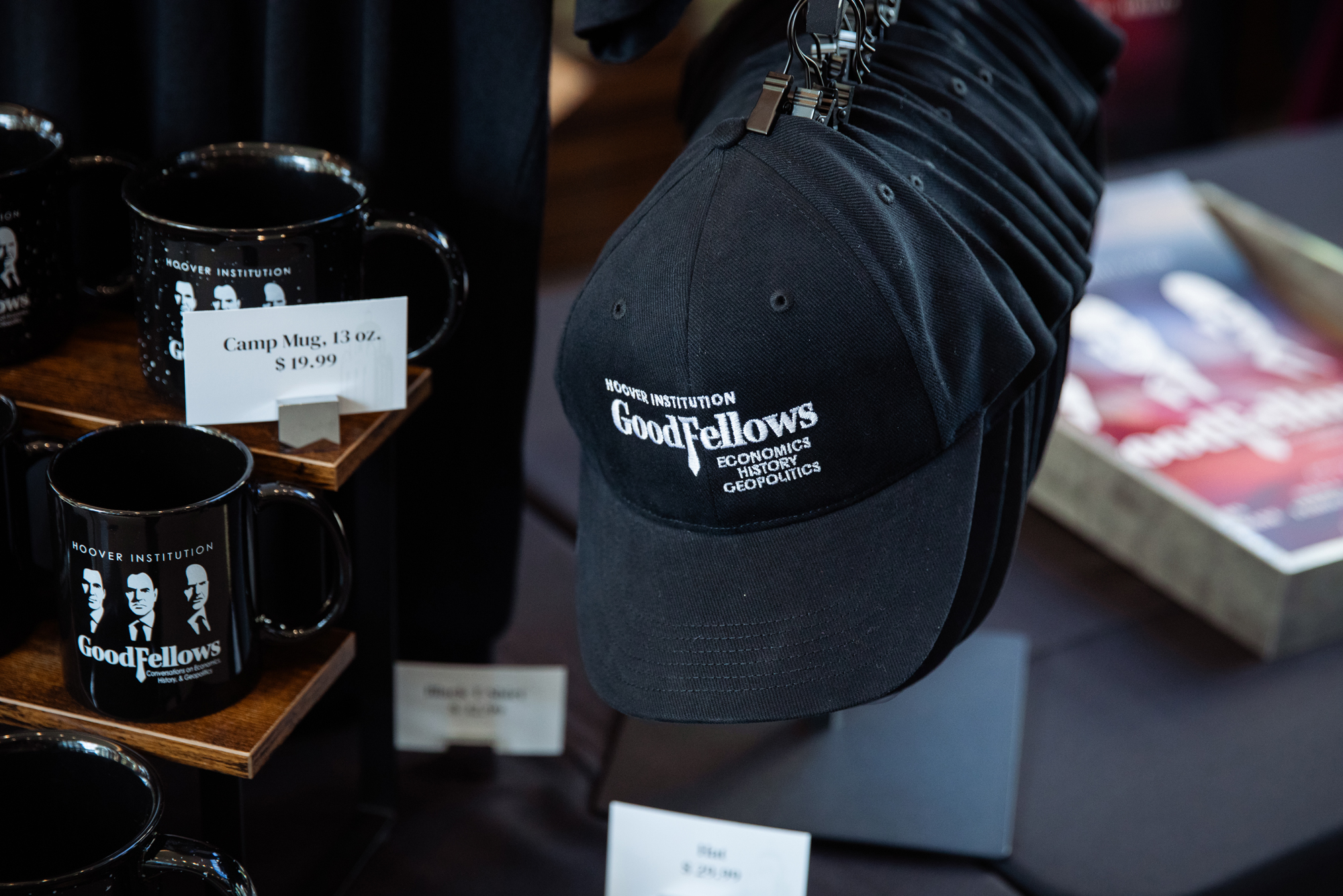 GoodFellows hats and mugs for sale are seen in Traitel Pavillion on April 22, 2026. (Patrick Beaudouin)