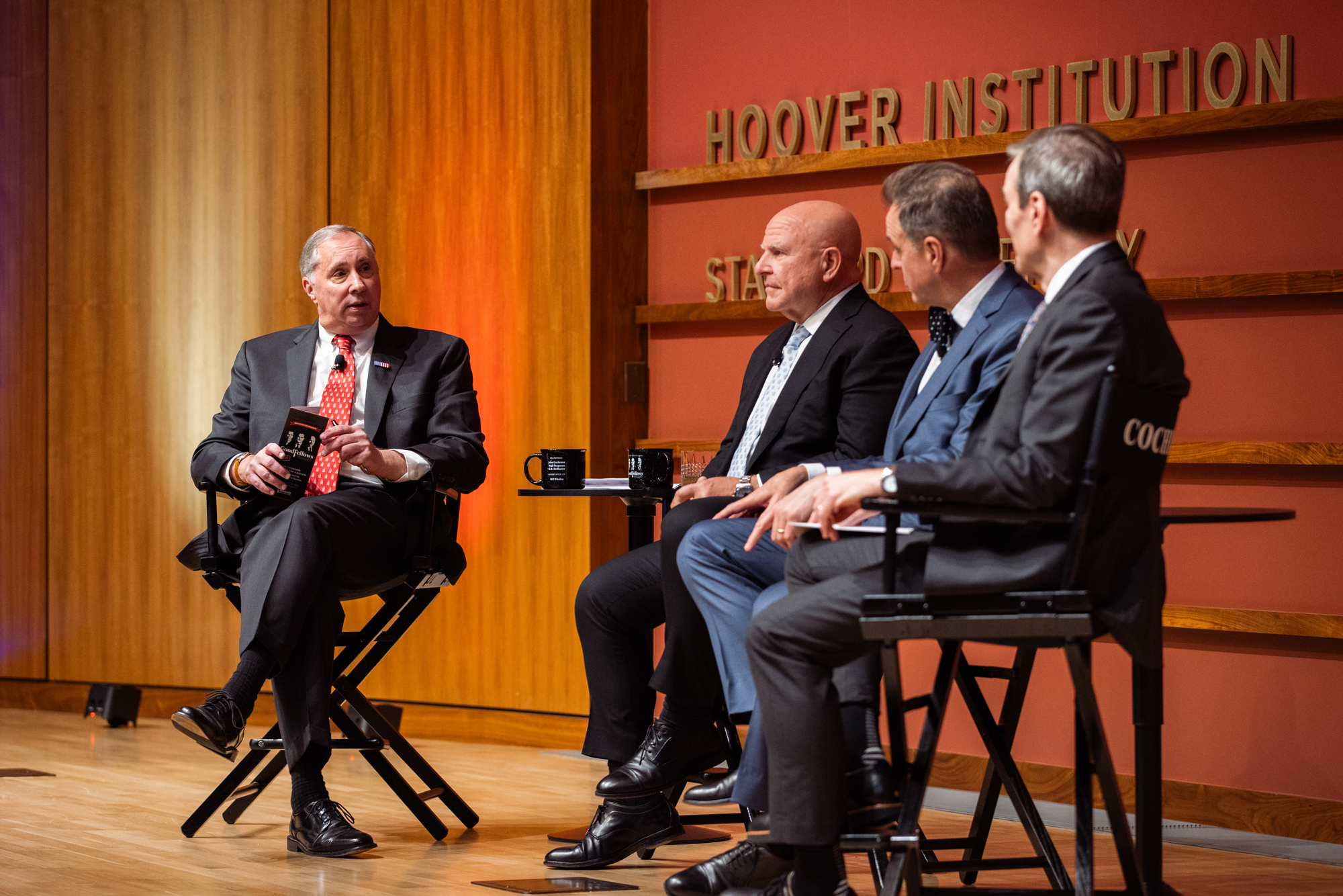 The GoodFellows (from left to right: Bill Whalen, H.R. McMaster, Niall Ferguson and John Cochrane) are seen during a live taping of their podcast inside Hoover’s Hauck Auditorium on April 22, 2026. (Patrick Beaudouin)