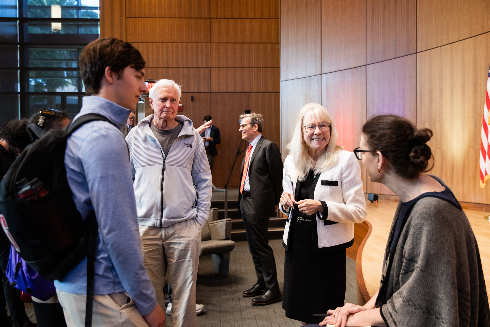 Attendees of a May 12 USA @ 250 lecture series event interact with speakers John Cochrane, Valerie Ramey and Megan McArdle in Hoover’s Hauck Auditorium on May 12, 2026. (Patrick Beaudouin) 