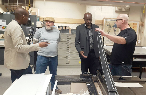 The Falls discuss conservation and preservation techniques with Hoover Rayan Ghazal, Hoover preservation officer, and library specialist James Fayne The Falls discuss conservation and preservation techniques with Hoover Rayan Ghazal, Hoover preservation officer, and library specialist James Fayne