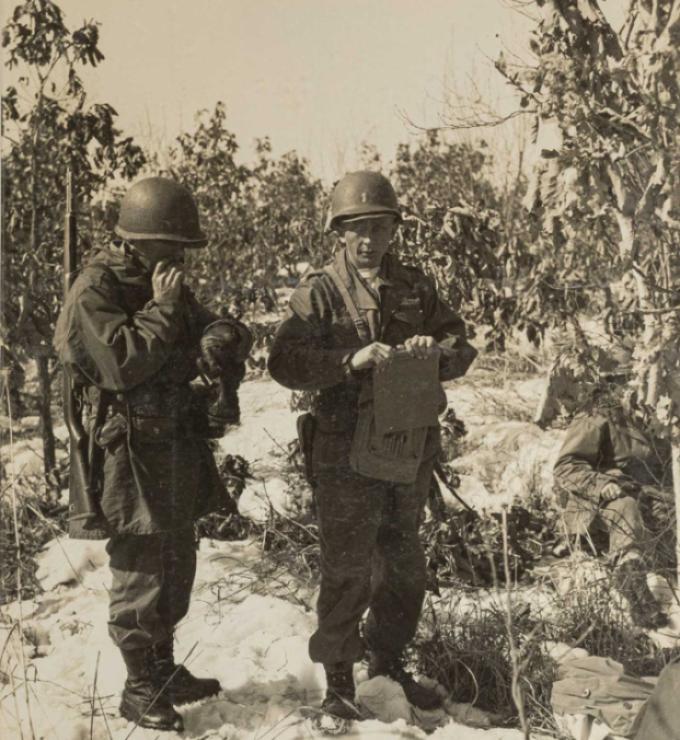 Rasula - sepia toned photo of 2 soldiers in the field