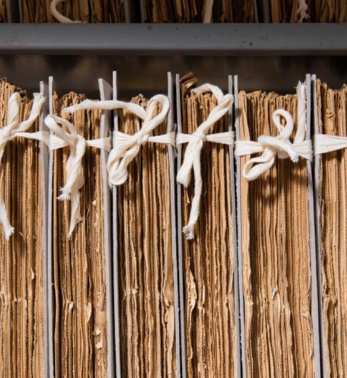 Cotton tied newspapers