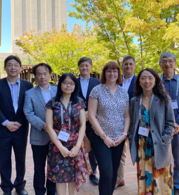 Modern China and Taiwan Workshop 2023 speakers stand in front of Hoover Tower and HHMB