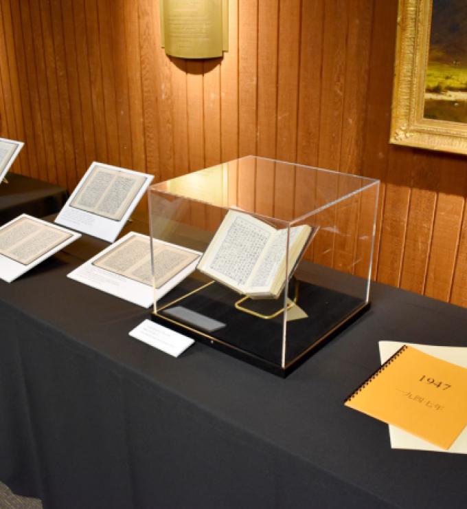 Exhibit of Chiang Ching-kuo diaries on a table with black tablecloth