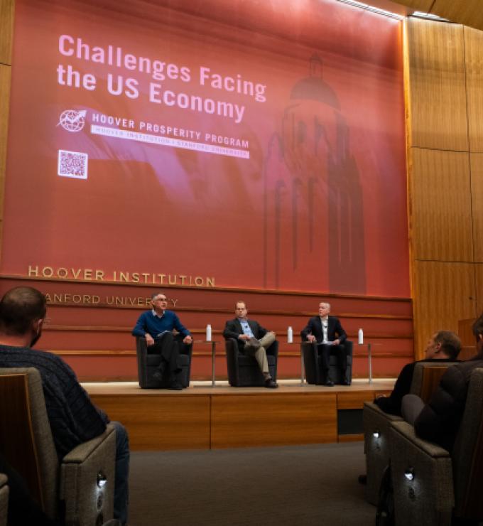 Emmanuel Saez (left), Bruce Meyer and Senior Fellow Ross Levine discuss income inequality at the Challenges Facing the US Economy Conference on January 21, 2025. (Patrick Beaudouin)