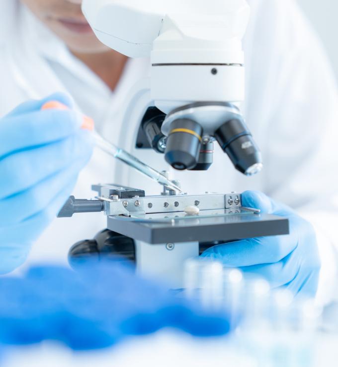 Scientist analyze biochemical samples in advanced scientific laboratory. Medical professional use microscope look microbiological developmental of viral. Biotechnology research in science lab. stock photo