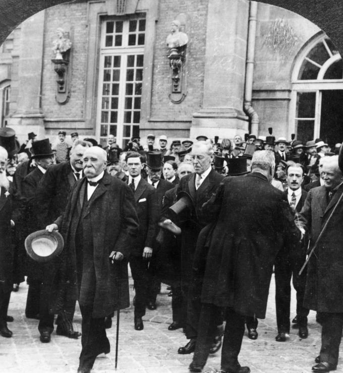 1919: French prime minister Georges Clemenceau (1841 - 1929) (L), US president Woodrow Wilson (1856 - 1924) (C) and British prime minister David Lloyd George (1863 - 1945) attend negotiations for the Treaty of Versailles. (Photo by Hulton Archive/Getty Images)