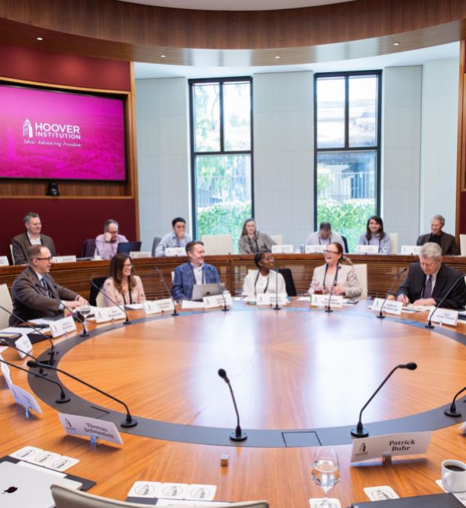 Scholars participating in PEPCON 2026 are seen in Hoover’s Annenberg Conference Room on April 16, 2026. (Patrick Beaudouin)