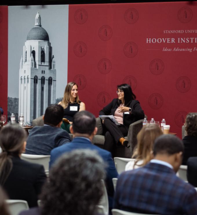 Senior Fellow Eugene Volokh (right), Katie Visser of Cloudflare, Ellie Sakahee of Google and Nicole Lopez of Orrick LLP are seen in Hoover’s Stauffer Auditorium on July 21, 2026.