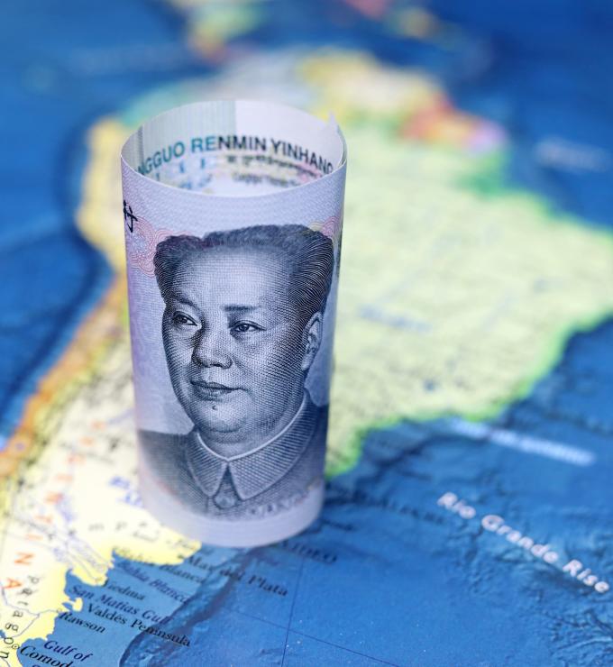 Chinese yuan on the map of South America - stock photo