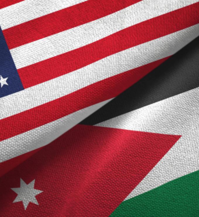 Jordan and United States two flags together textile cloth, fabric texture - stock photo