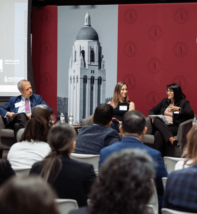 Senior Fellow Eugene Volokh (right), Katie Visser of Cloudflare, Ellie Sakahee of Google and Nicole Lopez of Orrick LLP are seen in Hoover’s Stauffer Auditorium on July 21, 2026.