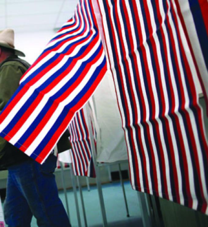 man leaves voting booth