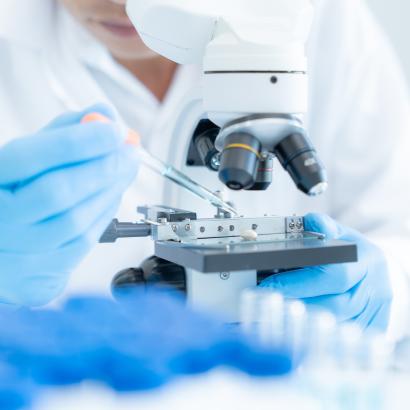 Scientist analyze biochemical samples in advanced scientific laboratory. Medical professional use microscope look microbiological developmental of viral. Biotechnology research in science lab. stock photo
