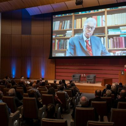 Thomas Sowell speaks on screen inside Hauck Auditorium at a celebration of his career on October 20, 2025. (Patrick Beaudouin)