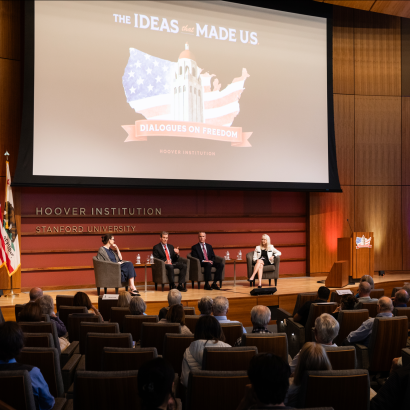 (From left to right) Washington Post columnist Megan McArdle and senior fellows John Cochrane, Ross Levine and Valerie Ramey speak about America’s future economic prospects in Hauck Auditorium on May 12, 2026. (Patrick Beaudouin)