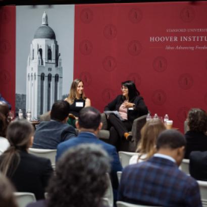 Senior Fellow Eugene Volokh (right), Katie Visser of Cloudflare, Ellie Sakahee of Google and Nicole Lopez of Orrick LLP are seen in Hoover’s Stauffer Auditorium on July 21, 2026.