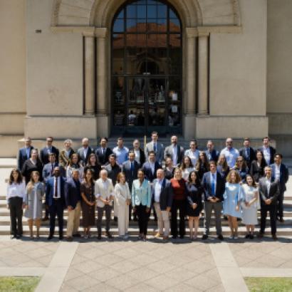 Participants in the 2026 Hoover Institution International Seminar stand with Condoleezza Rice before Hoover Tower on June 23, 2026. (Patrick Beaudouin)