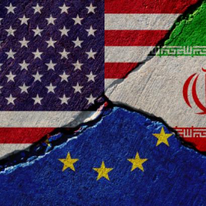 Concrete wall with painted united states, european union and iran flags stock photo