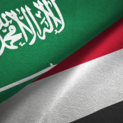 Yemen and Saudi Arabia two flags together textile cloth, fabric texture stock photo
