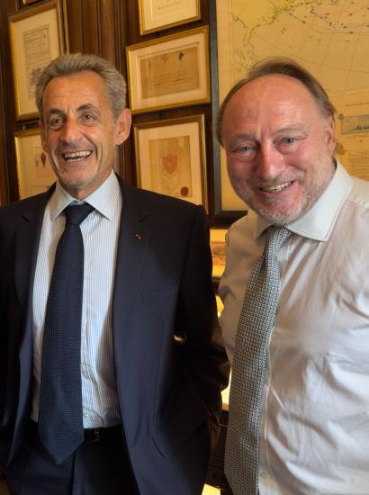 Carla Bruni, former French president Nicholas Sarkozy and Andrew Roberts are seen in London on June 4.