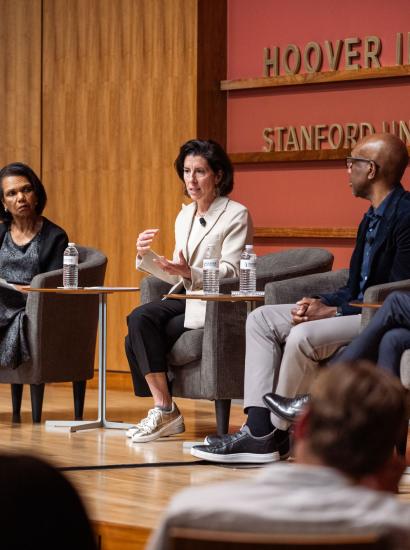 Hoover Institution Director Condoleezza Rice, Former US Commerce Secretary Gina Raimondo, Google-Alphabet executive James Manyika and Former UK Prime Minister and Hoover Distinguished Visiting Fellow Rishi Sunak are seen in Hauck Auditorium on March 17, 2026. (Patrick Beaudouin)