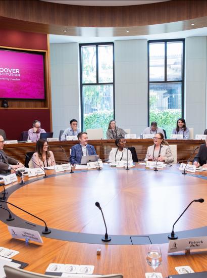 Scholars participating in PEPCON 2026 are seen in Hoover’s Annenberg Conference Room on April 16, 2026. (Patrick Beaudouin)