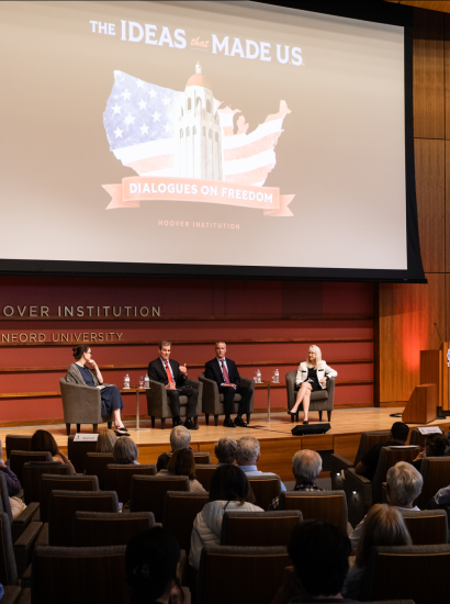 (From left to right) Washington Post columnist Megan McArdle and senior fellows John Cochrane, Ross Levine and Valerie Ramey speak about America’s future economic prospects in Hauck Auditorium on May 12, 2026. (Patrick Beaudouin)