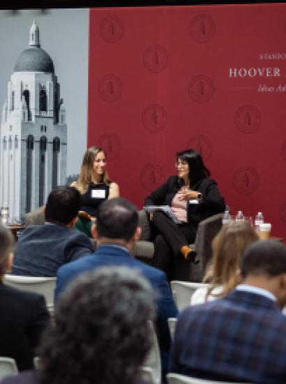 Senior Fellow Eugene Volokh (right), Katie Visser of Cloudflare, Ellie Sakahee of Google and Nicole Lopez of Orrick LLP are seen in Hoover’s Stauffer Auditorium on July 21, 2026.