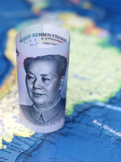 Chinese yuan on the map of South America - stock photo