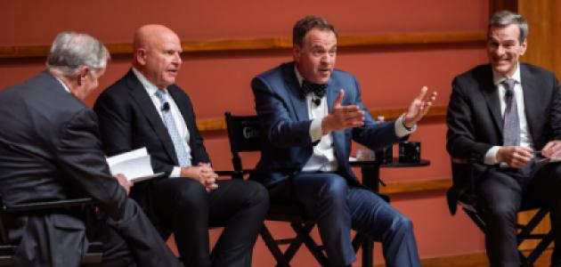 Senior Fellow and GoodFellows host Niall Ferguson gestures to the audience during a live taping of their podcast in Hoover’s Hauck Auditorium on April 22, 2026. (Patrick Beaudouin)