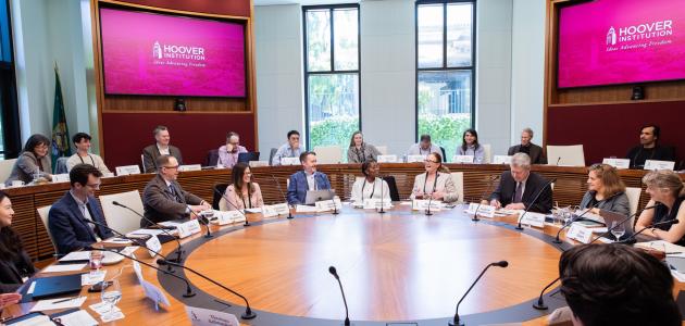 Scholars participating in PEPCON 2026 are seen in Hoover’s Annenberg Conference Room on April 16, 2026. (Patrick Beaudouin)