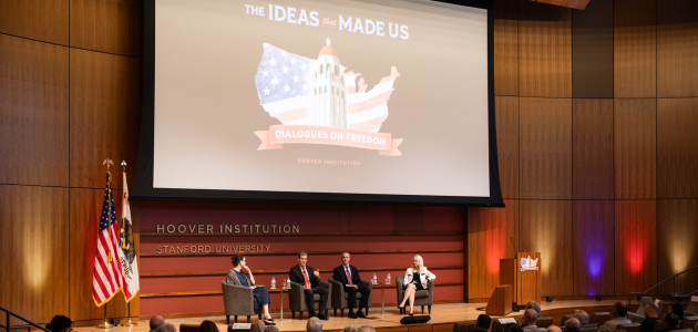 (From left to right) Washington Post columnist Megan McArdle and senior fellows John Cochrane, Ross Levine and Valerie Ramey speak about America’s future economic prospects in Hauck Auditorium on May 12, 2026. (Patrick Beaudouin)