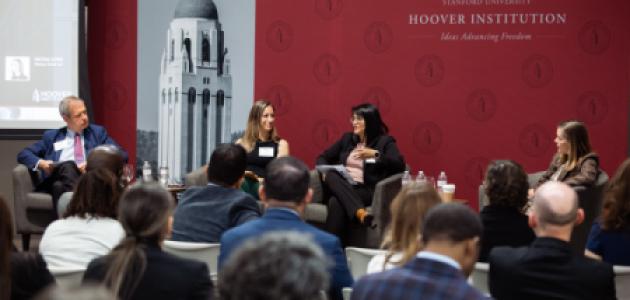Senior Fellow Eugene Volokh (right), Katie Visser of Cloudflare, Ellie Sakahee of Google and Nicole Lopez of Orrick LLP are seen in Hoover’s Stauffer Auditorium on July 21, 2026.