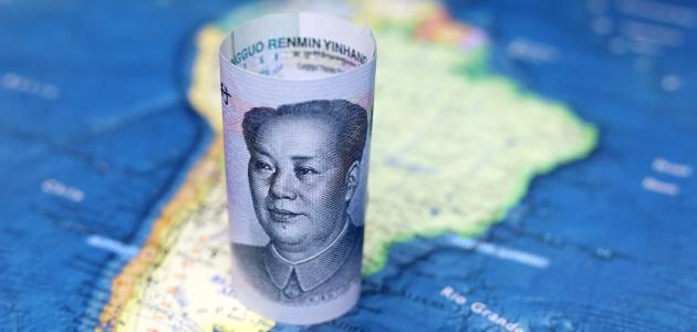 Chinese yuan on the map of South America - stock photo