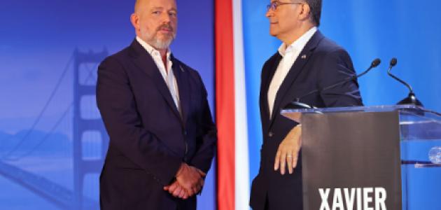 CLAREMONT, CALIFORNIA - APRIL 28: (L-R) Steve Hilton (R) and Xavier Becerra (D) speak during CBS Television Stations' California Gubernatorial Debate on April 28, 2026 in Claremont, California. (Photo by Leon Bennett/Getty Images for CBS Television Stations)