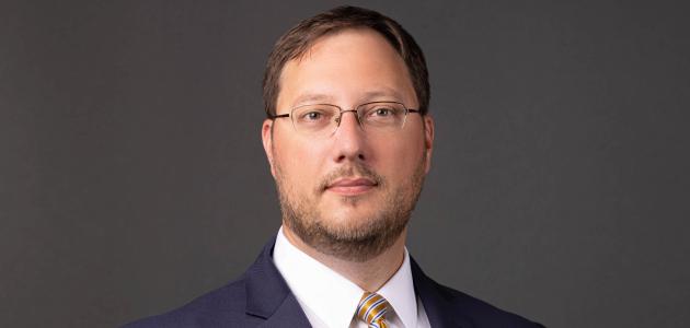Adam J. White