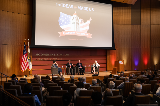 (From left to right) Washington Post columnist Megan McArdle and senior fellows John Cochrane, Ross Levine and Valerie Ramey speak about America’s future economic prospects in Hauck Auditorium on May 12, 2026. (Patrick Beaudouin)
