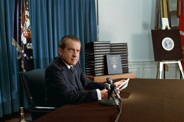 President Nixon, with edited transcripts of Nixon White House Tape conversations during broadcast of his address to the Nation.