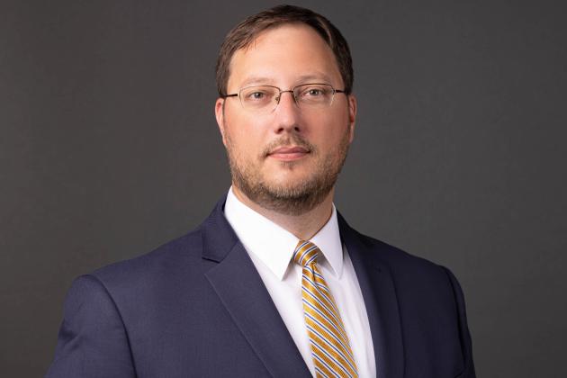 Adam J. White