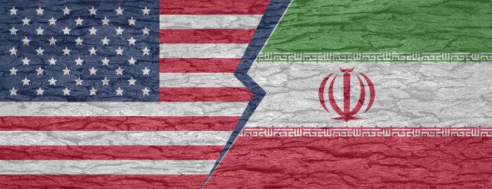 Severed ground separating the countries of america and iran on a cracked surface - stock illustration