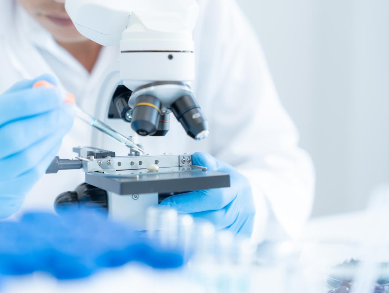 Scientist analyze biochemical samples in advanced scientific laboratory. Medical professional use microscope look microbiological developmental of viral. Biotechnology research in science lab. stock photo