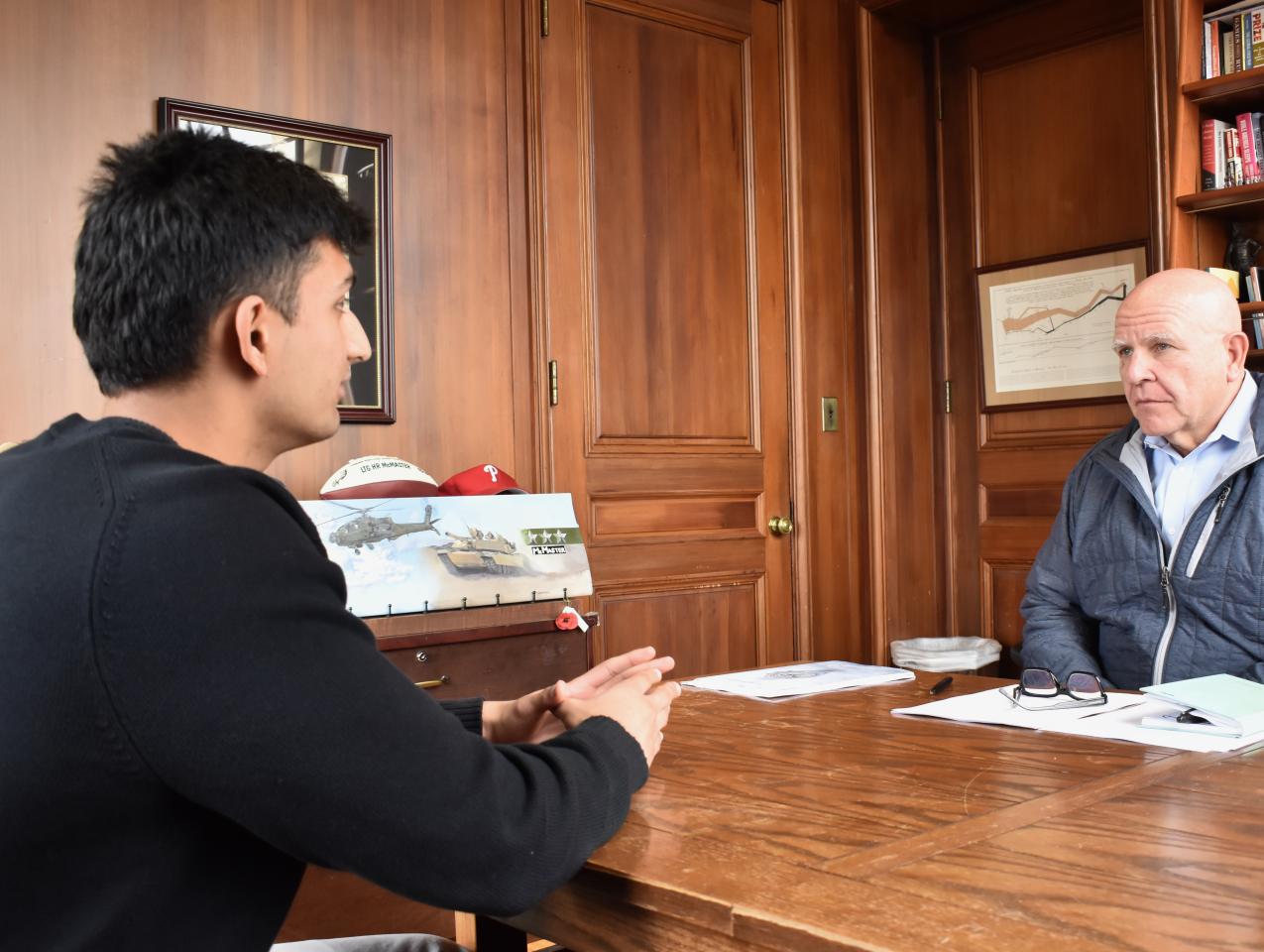 Ahvish Roy (left) and H.R. McMaster discuss Roy’s work at Hoover inside McMaster’s office in Hoover Tower on January 21, 2026. (Chris Herhalt)