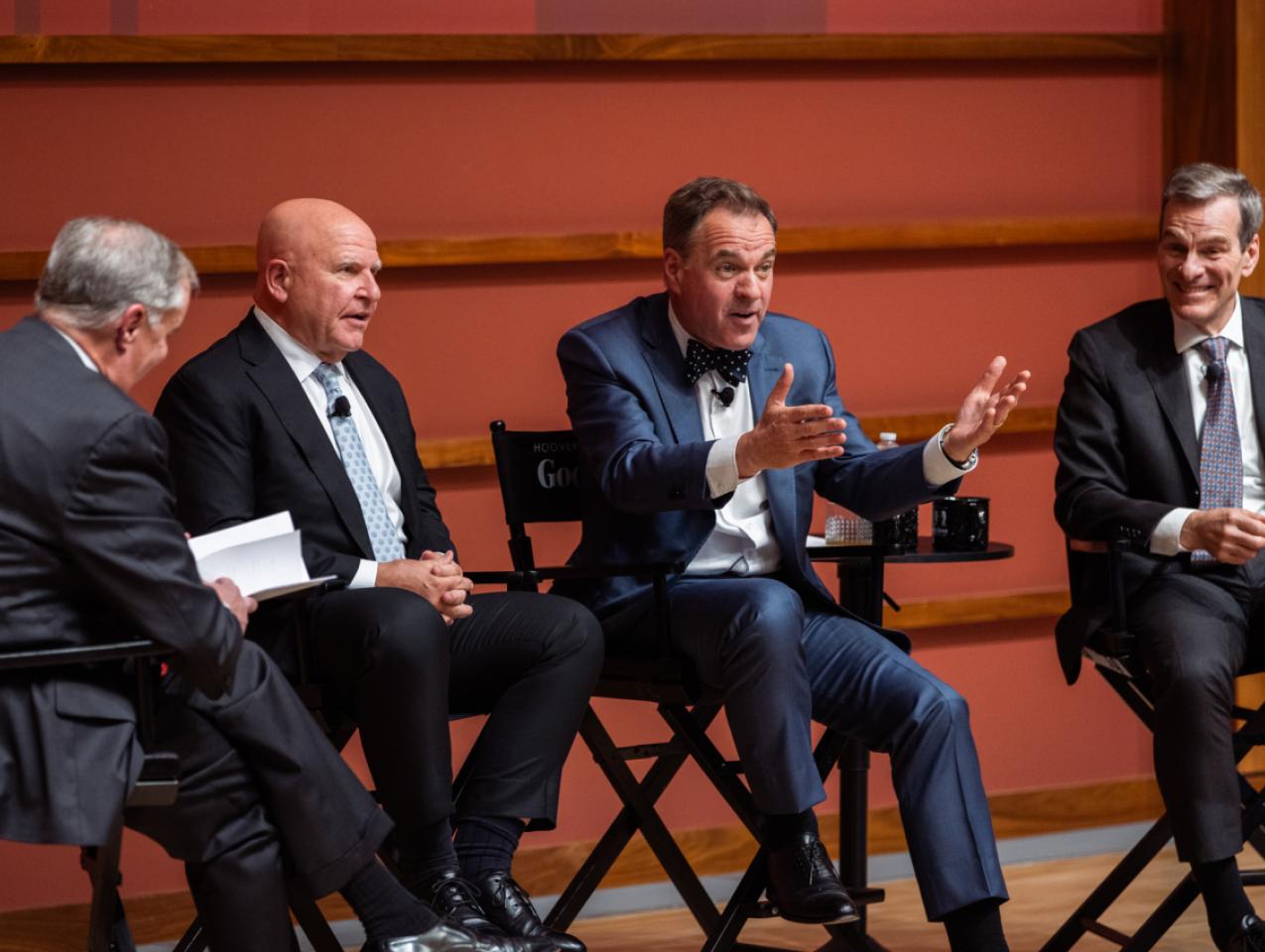 Senior Fellow and GoodFellows host Niall Ferguson gestures to the audience during a live taping of their podcast in Hoover’s Hauck Auditorium on April 22, 2026. (Patrick Beaudouin)