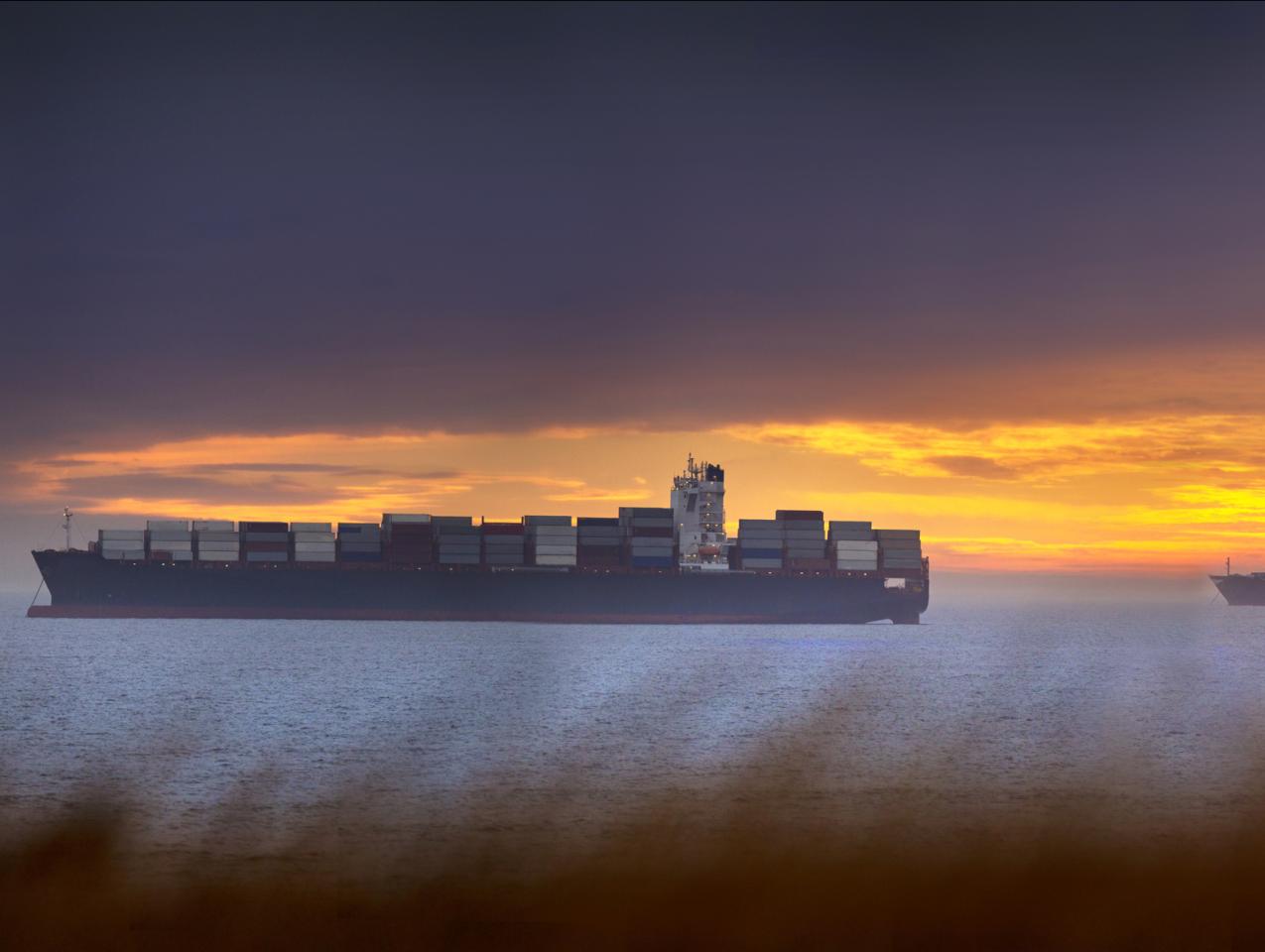 High resolution image of Container ships waiting to enter Cape Town harbour. - stock photo